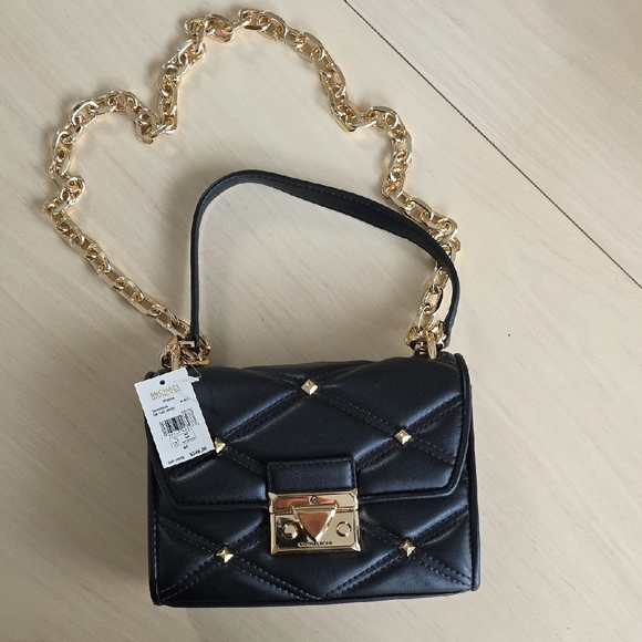 Michael Kors Handbags - Michael Kors Black Mini Bag with Gold Chain